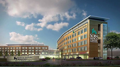 The image shows a modern multi-story building with a sign that reads  Southern Hills Hospital,  featuring architectural details such as large windows, a prominent entrance, and signage indicating its affiliation with the hospital.